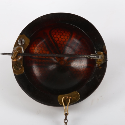 270 - A Victorian tortoiseshell gold and silver pique inlaid bombe shield brooch, diameter 40.9mm, 10g