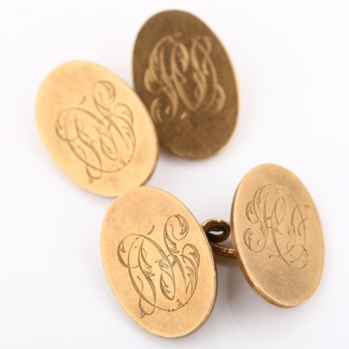 275 - A pair of early 20th century 9ct gold oval cufflinks, maker's marks WJS, hallmarks Birmingham 1922, ... 