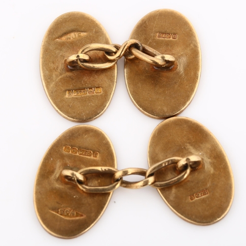 275 - A pair of early 20th century 9ct gold oval cufflinks, maker's marks WJS, hallmarks Birmingham 1922, ... 