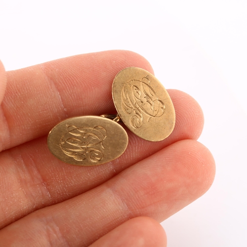 275 - A pair of early 20th century 9ct gold oval cufflinks, maker's marks WJS, hallmarks Birmingham 1922, ... 