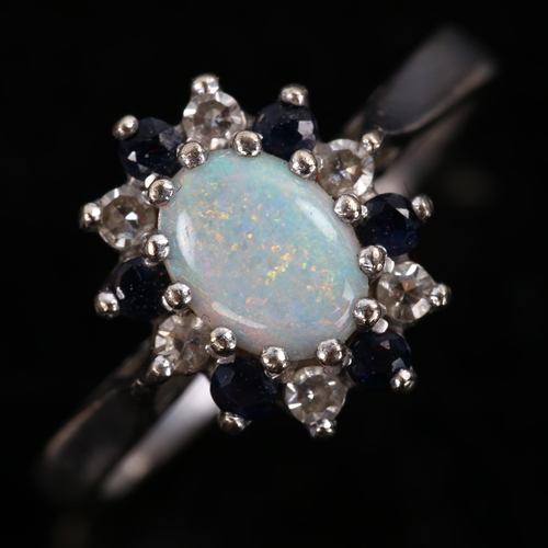 276 - A late 20th century 18ct white gold opal sapphire and diamond cluster ring, set with oval cabochon o... 