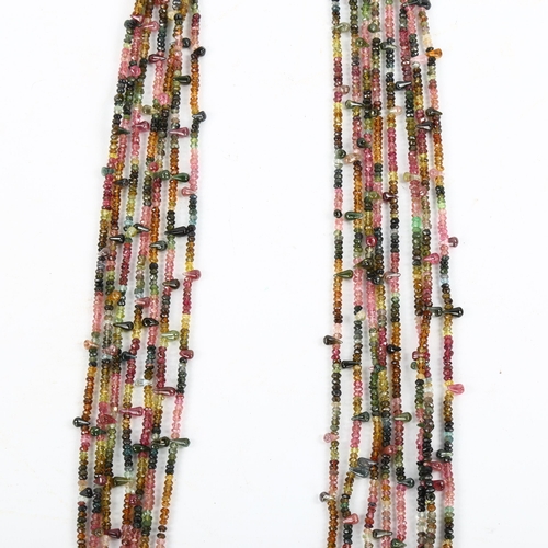 289 - A Vintage 8-strand vari-hue tourmaline scarf drape necklace, with rough-cut and teardrop beads, over... 