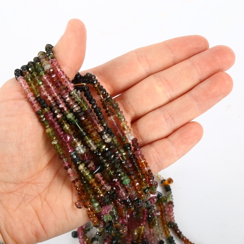 289 - A Vintage 8-strand vari-hue tourmaline scarf drape necklace, with rough-cut and teardrop beads, over... 