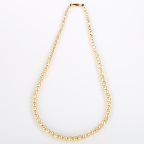 293 - A single-strand graduated pearl necklace, with 9ct rose gold barrel clasp, pearls ranging from 3.2mm... 