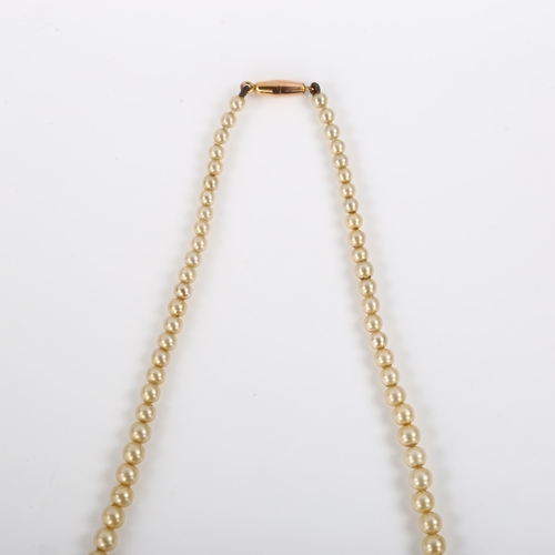 293 - A single-strand graduated pearl necklace, with 9ct rose gold barrel clasp, pearls ranging from 3.2mm... 