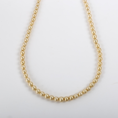 293 - A single-strand graduated pearl necklace, with 9ct rose gold barrel clasp, pearls ranging from 3.2mm... 