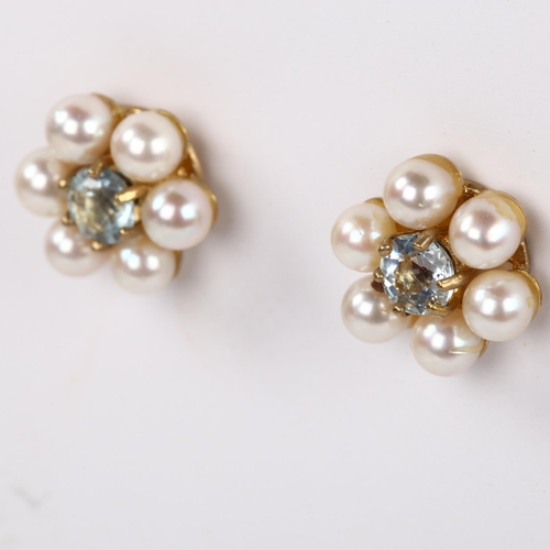 296 - A pair of late 20th century 9ct gold aquamarine and pearl cluster earrings, with stud fittings, hall... 