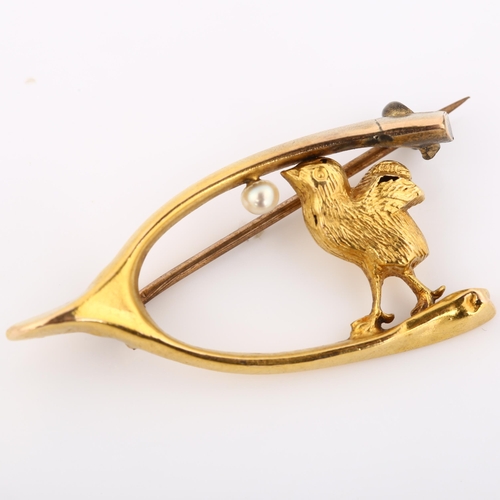 303 - A 19th century 15ct gold pearl figural chick and wishbone brooch, indistinct maker's marks, hallmark... 