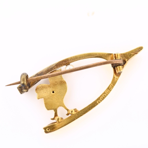 303 - A 19th century 15ct gold pearl figural chick and wishbone brooch, indistinct maker's marks, hallmark... 