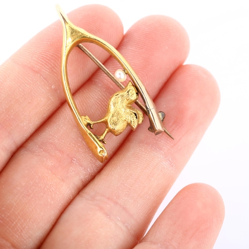 303 - A 19th century 15ct gold pearl figural chick and wishbone brooch, indistinct maker's marks, hallmark... 