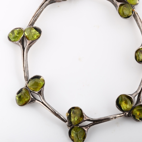 310 - A Vintage Continental silver peridot flower bud bracelet, length 18.5cm, 21.5g