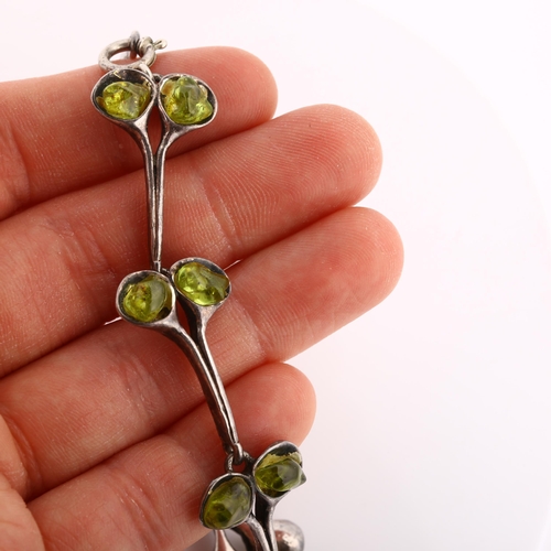 310 - A Vintage Continental silver peridot flower bud bracelet, length 18.5cm, 21.5g