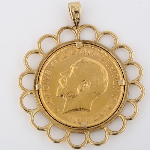 323 - A George V 1911 gold full sovereign coin, in 9ct gold pendant mount, overall diameter 32.5mm, 10.9g