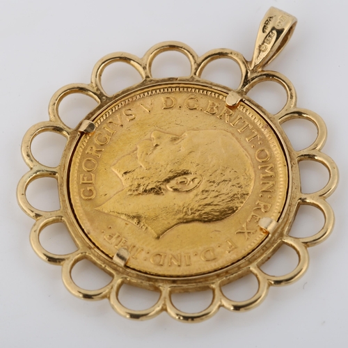 323 - A George V 1911 gold full sovereign coin, in 9ct gold pendant mount, overall diameter 32.5mm, 10.9g