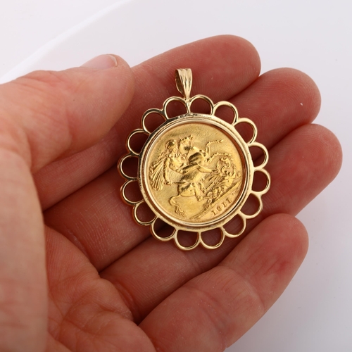 323 - A George V 1911 gold full sovereign coin, in 9ct gold pendant mount, overall diameter 32.5mm, 10.9g