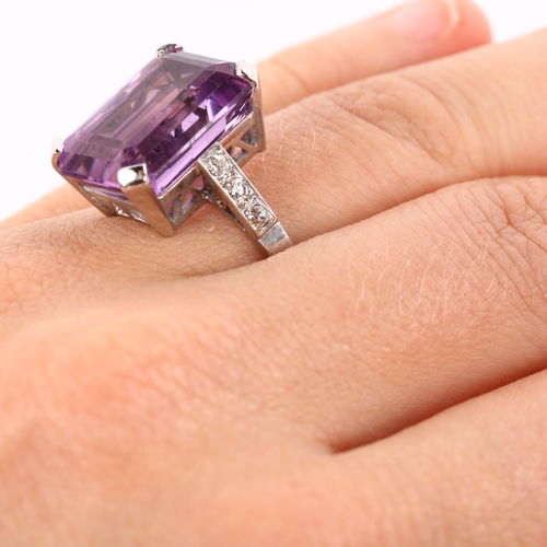 328 - A late 20th century amethyst and diamond dress ring, unmarked white metal settings test as 18ct, set... 