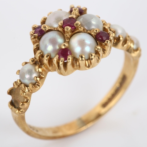 333 - A 14ct gold ruby and pearl dress ring, setting height 11.1mm, size J, 3.2g