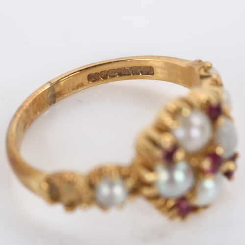 333 - A 14ct gold ruby and pearl dress ring, setting height 11.1mm, size J, 3.2g