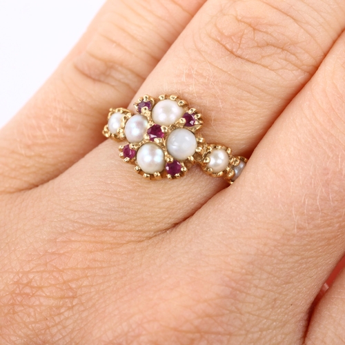 333 - A 14ct gold ruby and pearl dress ring, setting height 11.1mm, size J, 3.2g