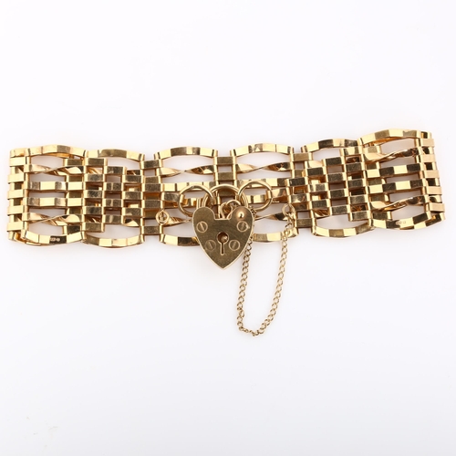 334 - A 9ct gold gatelink bracelet, with heart padlock clasp, length 18cm, 13.2g