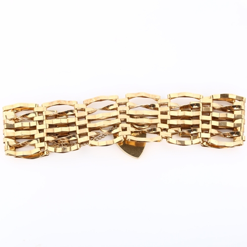 334 - A 9ct gold gatelink bracelet, with heart padlock clasp, length 18cm, 13.2g