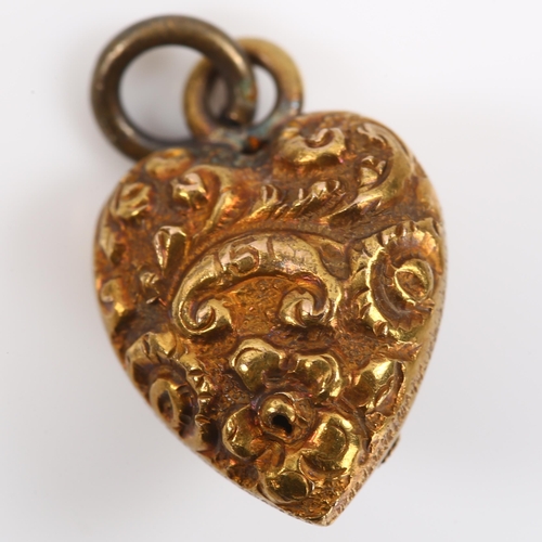 338 - A miniature Victorian 15ct gold heart pendant, with applied knot motif and relief embossed foliate d... 