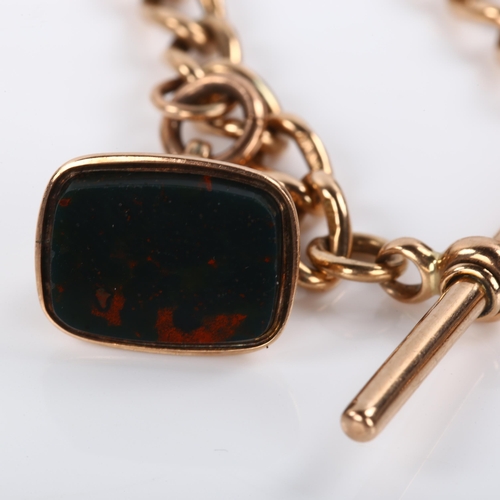 341 - An early 20th century 9ct rose gold curb link Albert chain bracelet, with 9ct T-bar, bloodstone seal... 