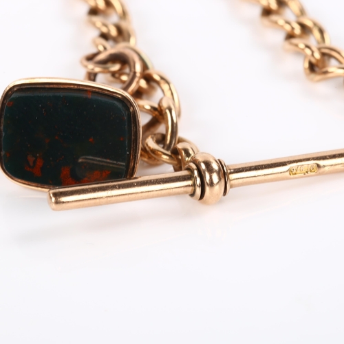 341 - An early 20th century 9ct rose gold curb link Albert chain bracelet, with 9ct T-bar, bloodstone seal... 