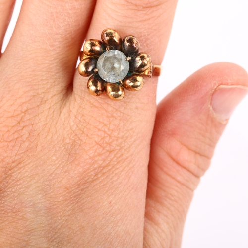 343 - A Continental 18ct rose gold blue stone flowerhead dress ring, setting height 15.8mm, size M, 4g