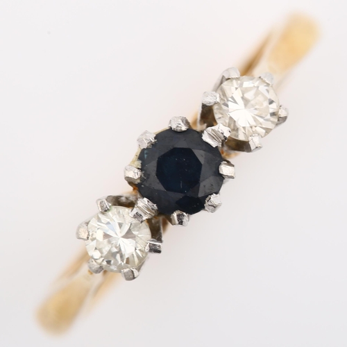 344 - An 18ct gold three stone sapphire and diamond ring, set with round-cut sapphire and diamonds, total ... 