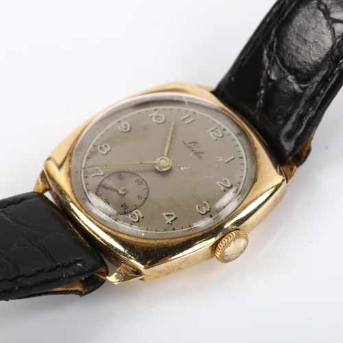 10 - LEDA - an early 20th century 9ct gold mechanical wristwatch, silvered dial with Arabic numerals, sub... 