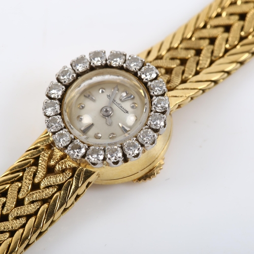 17 - JAEGER LE COULTRE - a lady's French 18ct gold diamond mechanical cocktail bracelet watch, circa 1950... 