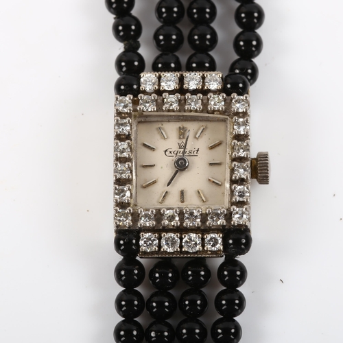 19 - EXQUISIT - a lady's 18ct white gold diamond and jet mechanical cocktail bracelet watch, circa 1960s,... 