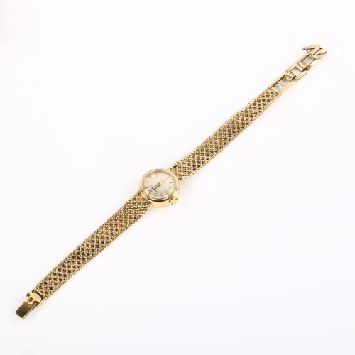 20 - OMEGA - a lady's 9ct gold Ladymatic automatic bracelet watch, circa 1966, silvered dial with gilt ba... 