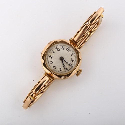 24 - A lady's 9ct gold mechanical bracelet watch, silvered dial with Arabic numerals, blued steel hands a... 