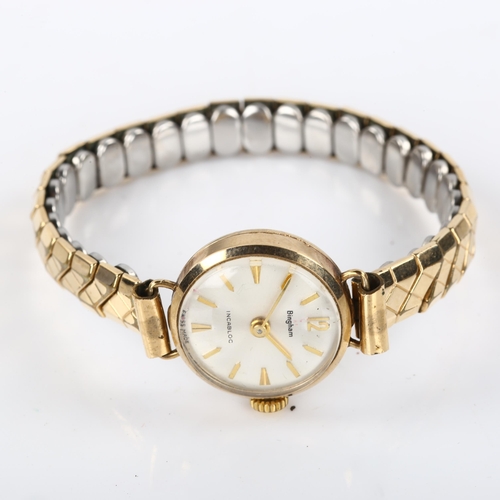 25 - BINGHAM - a lady's 9ct gold mechanical bracelet watch, silvered dial with gilt arrowhead hour marker... 