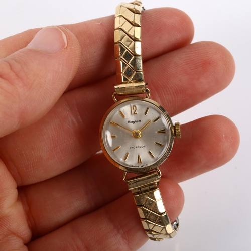 25 - BINGHAM - a lady's 9ct gold mechanical bracelet watch, silvered dial with gilt arrowhead hour marker... 