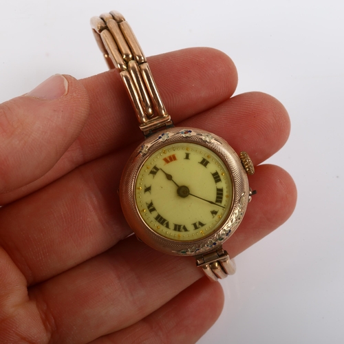 27 - A First World War Period 9ct rose gold mechanical bracelet watch, white enamel dial with Arabic nume... 