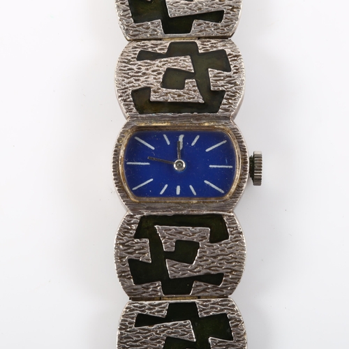 28 - A lady's mid-century silver and enamel bracelet watch, blue enamel dial with white baton hour marker... 