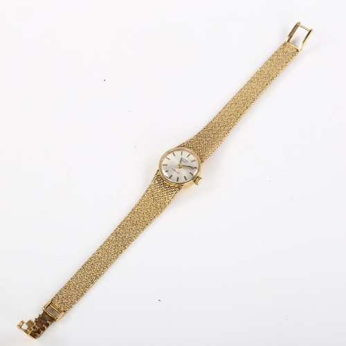 29 - ROTARY - a lady's 9ct gold mechanical bracelet watch, silvered dial with gilt baton hour markers and... 