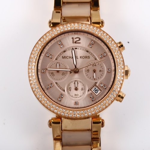 30 - MICHAEL KORS - a lady's rose gold plated stainless steel quartz chronograph bracelet watch, ref. MK-... 