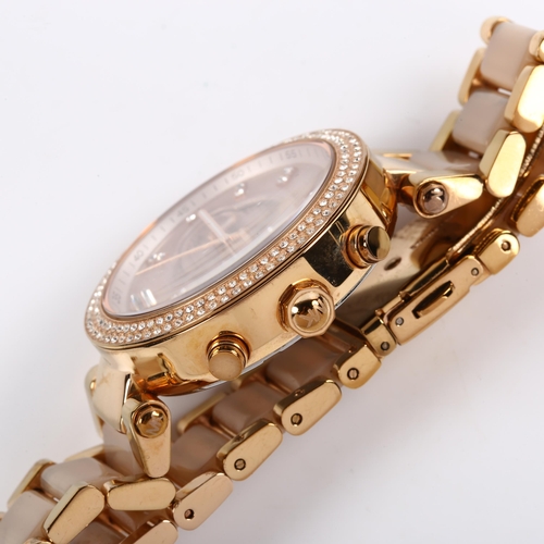 30 - MICHAEL KORS - a lady's rose gold plated stainless steel quartz chronograph bracelet watch, ref. MK-... 