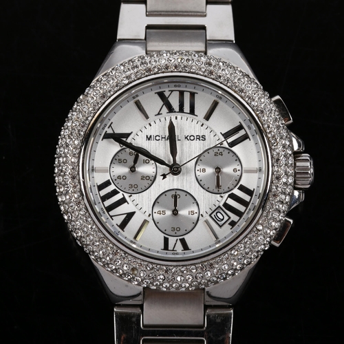 31 - MICHAEL KORS - a lady's stainless steel quartz chronograph bracelet watch, ref. MK-5634, silvered di... 