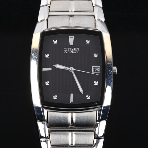 45 - CITIZEN - a stainless steel Eco-Drive quartz bracelet watch, ref. E111-3049385, black dial with stee... 