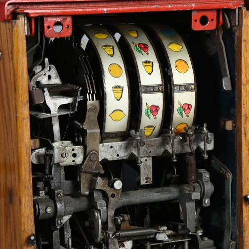 1001 - Mills High Top Bonus Bell arcade fruit machine converted to one-armed bandit, operating on an old 6d... 