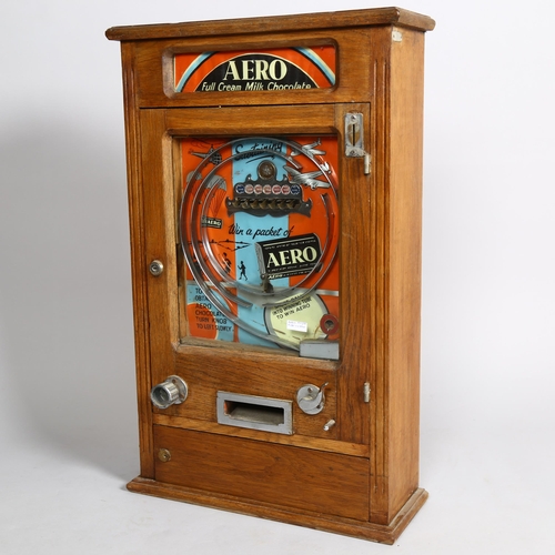 1009 - Ruffler & Walker Aero Chocolate amusement arcade wall machine circa 1950s, stained wood case, height... 