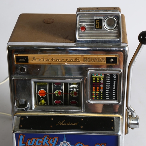 1014 - Aristocrat Nevada Lucky Strike one-armed bandit arcade machine, circa 1964, operating on an old shil... 