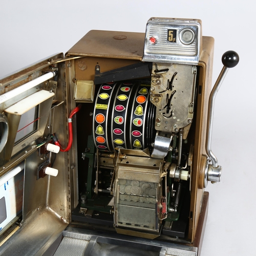 1014 - Aristocrat Nevada Lucky Strike one-armed bandit arcade machine, circa 1964, operating on an old shil... 