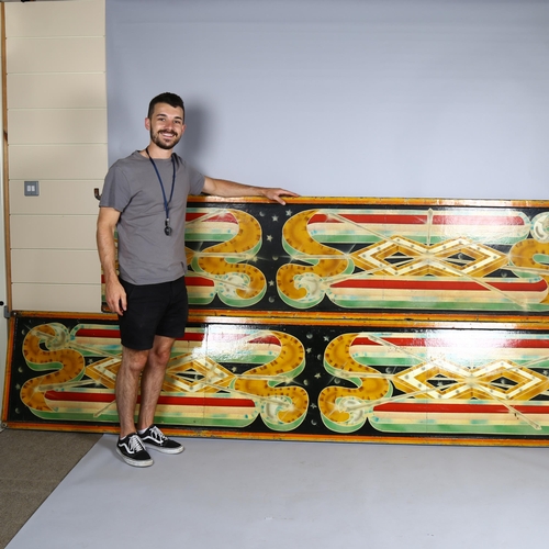 1016 - A set of coconut shy fairground boards, with hand painted designs, largest board 353cm x 68cm