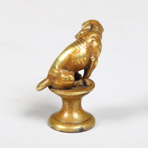 1029 - A 19th century gilt-bronze sculpture of a Dachshund, unsigned, height 5cm
